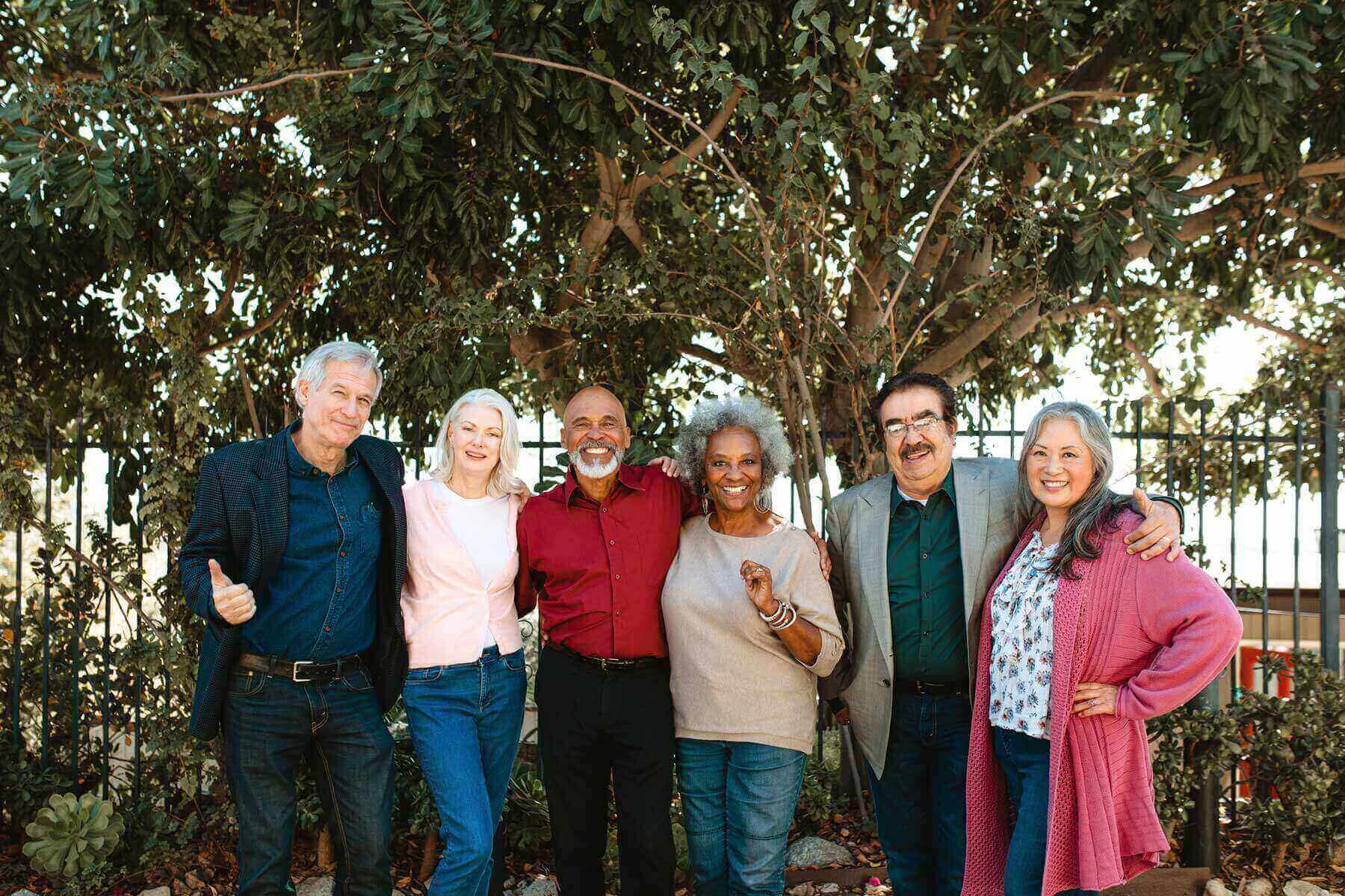 Friends with hearing loss gathered together for a picture